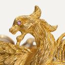Pulsera Lalaounis de dragones, en oro con rubíes, Grecia, c.1970