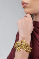 Pulsera Lalaounis de dragones, en oro con rubíes, Grecia, c.1970