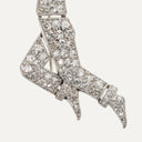 Broche tenista en oro blanco, diamantes y esmalte rosa