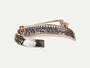 Antiguo broche «Creciente» de oro rosa y plata con diamantes y zafiros