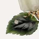 Broche floral de jade, diamantes y oro amarillo